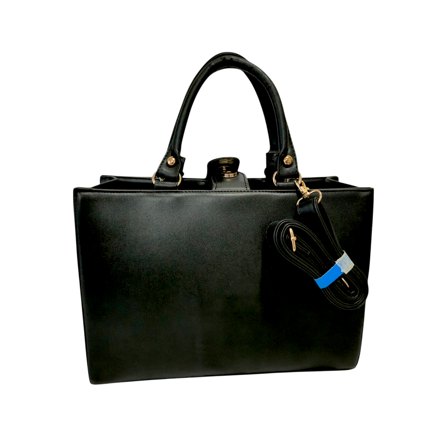 Bolsa artesanal negra con colibrí dorado en relieve y cartera a juego