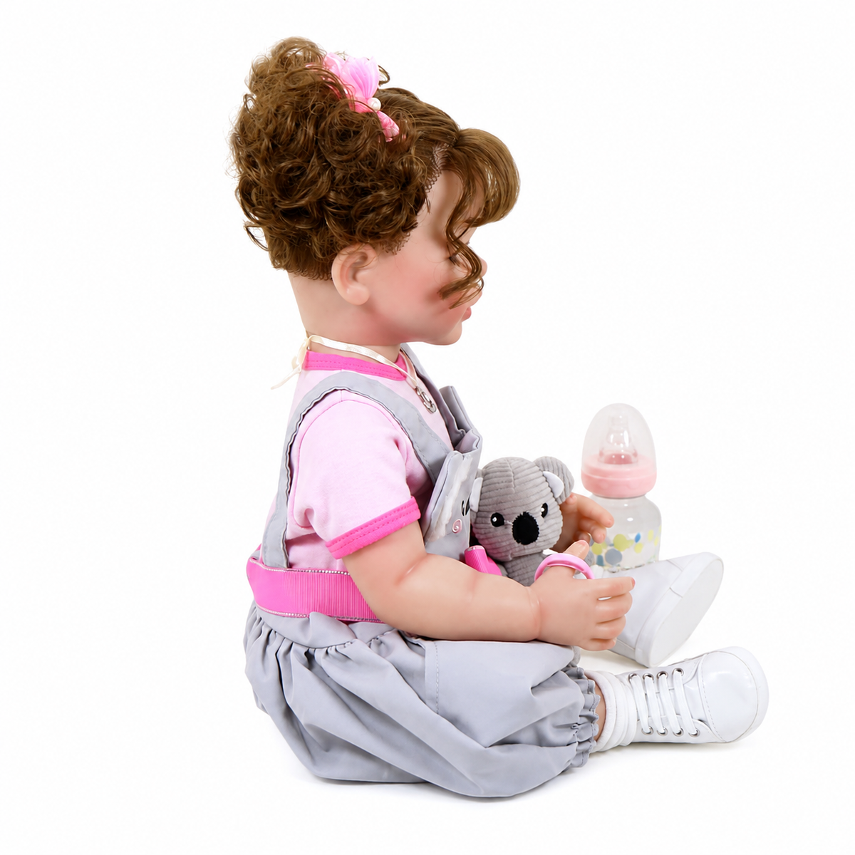 Muñeca Reborn Realista de 55 cm, Muñeca Bebé de Vinilo con Cabello Rizado y Vestido de Koala