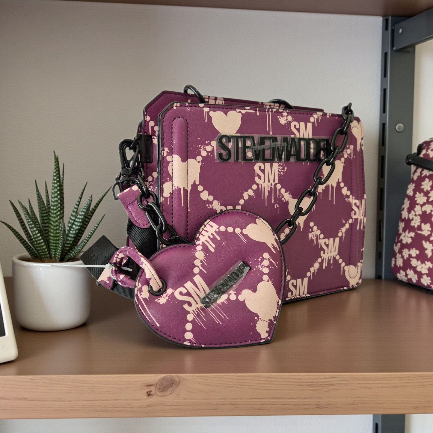 Bolsa original de diseñador en tono morado