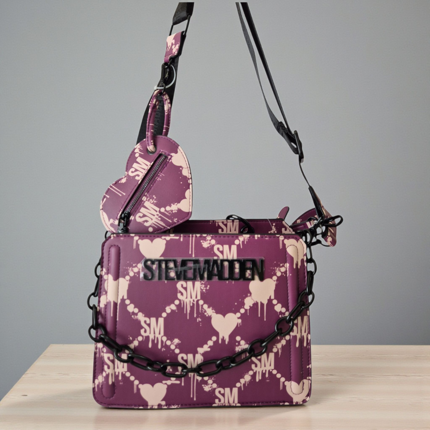 Bolsa original de diseñador en tono morado