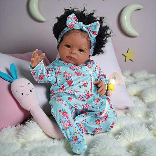 Muñeca bebé realista de 46cm tez morena con cuerpo de tela y extremidades de vinilo
