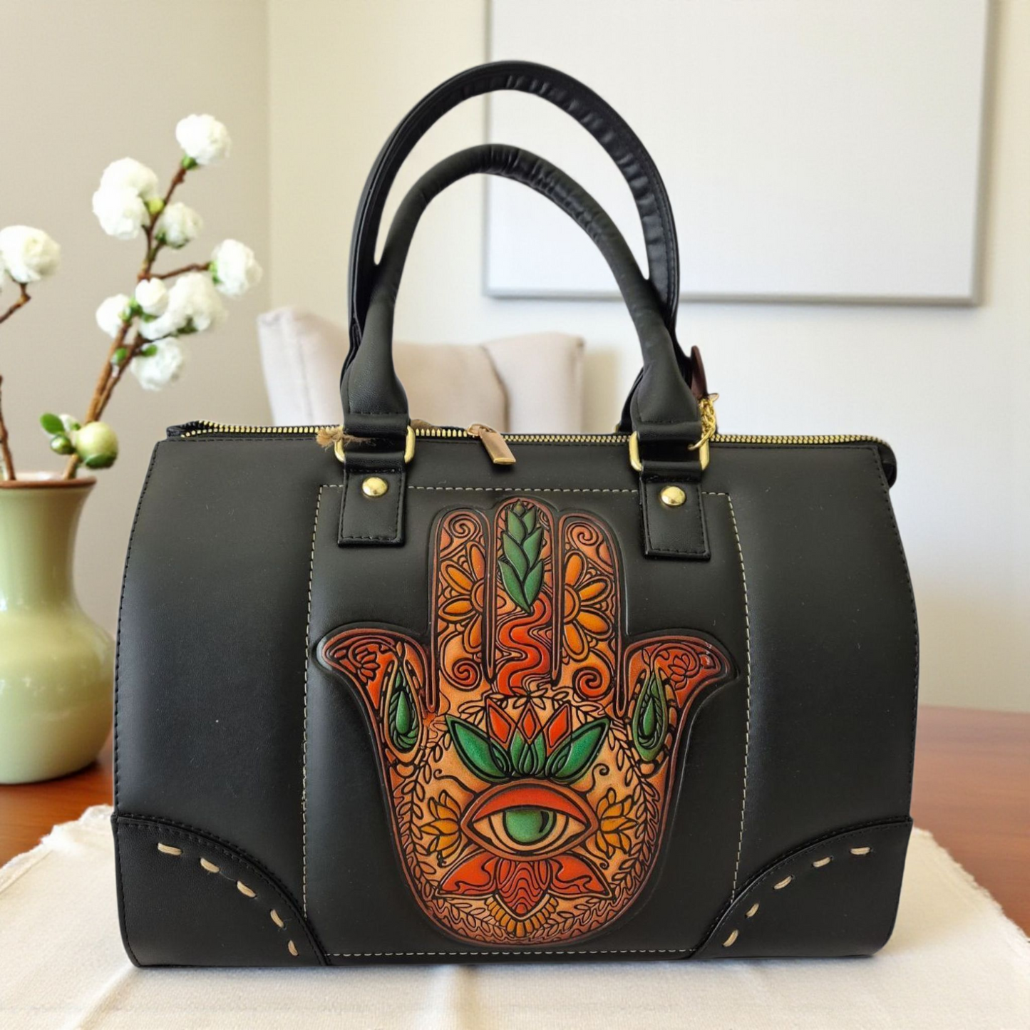 Black handbag with a handmade Fatima's Hand design – Elegant bohemian style