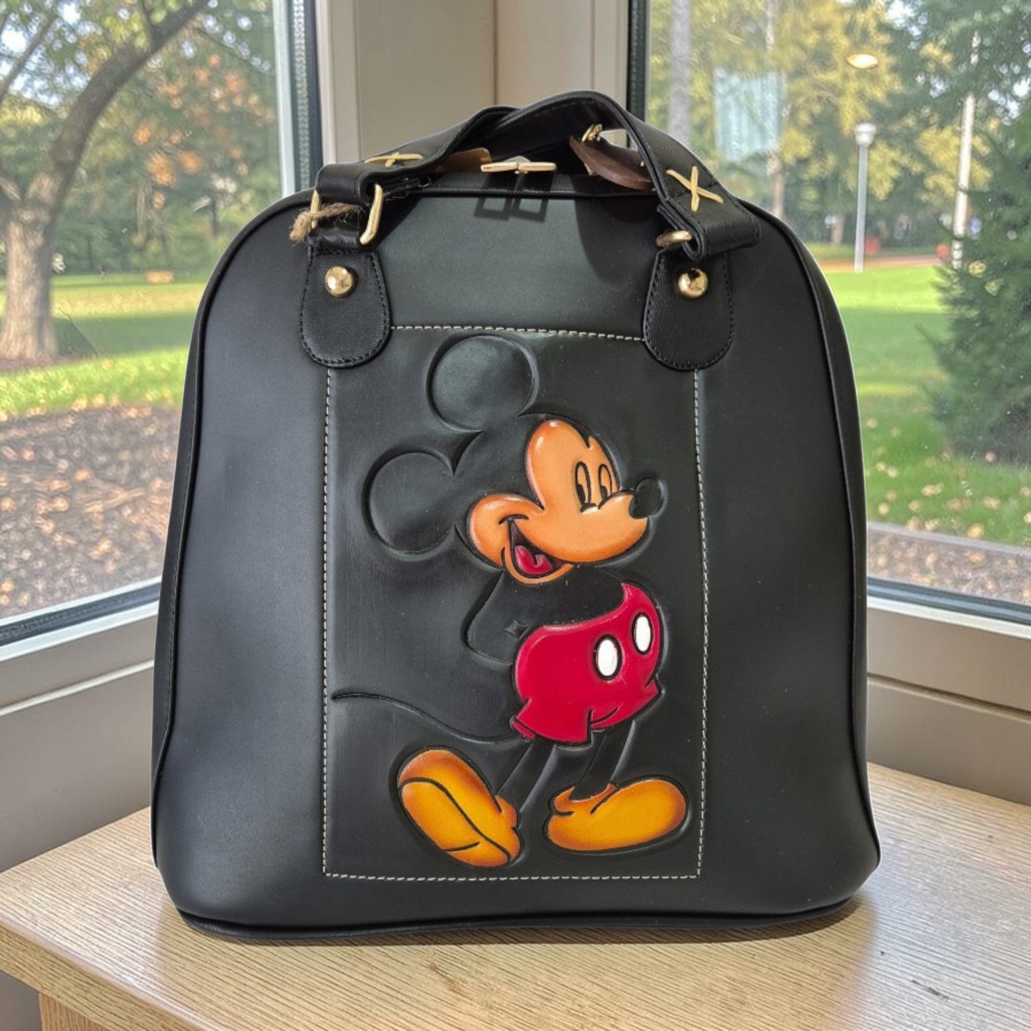 Black backpack with embossed character – Exclusive design, made in Mexico, top handle and handcrafted details