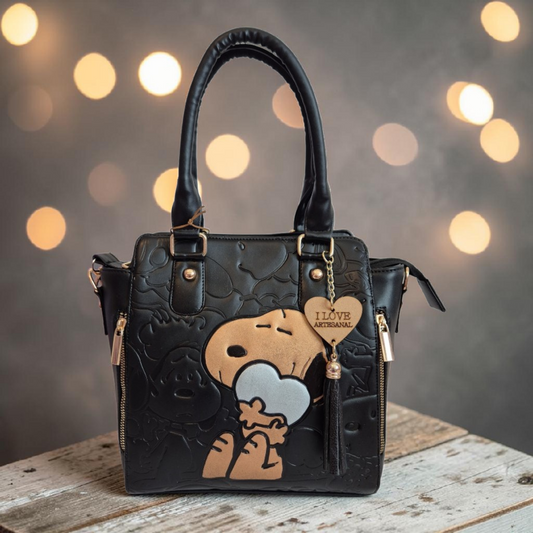 Bolsa Snoopy negra de mano con diseño grabado y correa ajustable