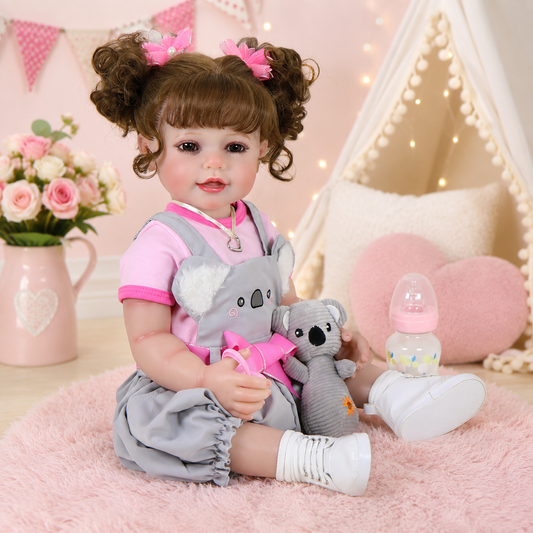 Muñeca Reborn Realista de 55 cm, Muñeca Bebé de Vinilo con Cabello Rizado y Vestido de Koala